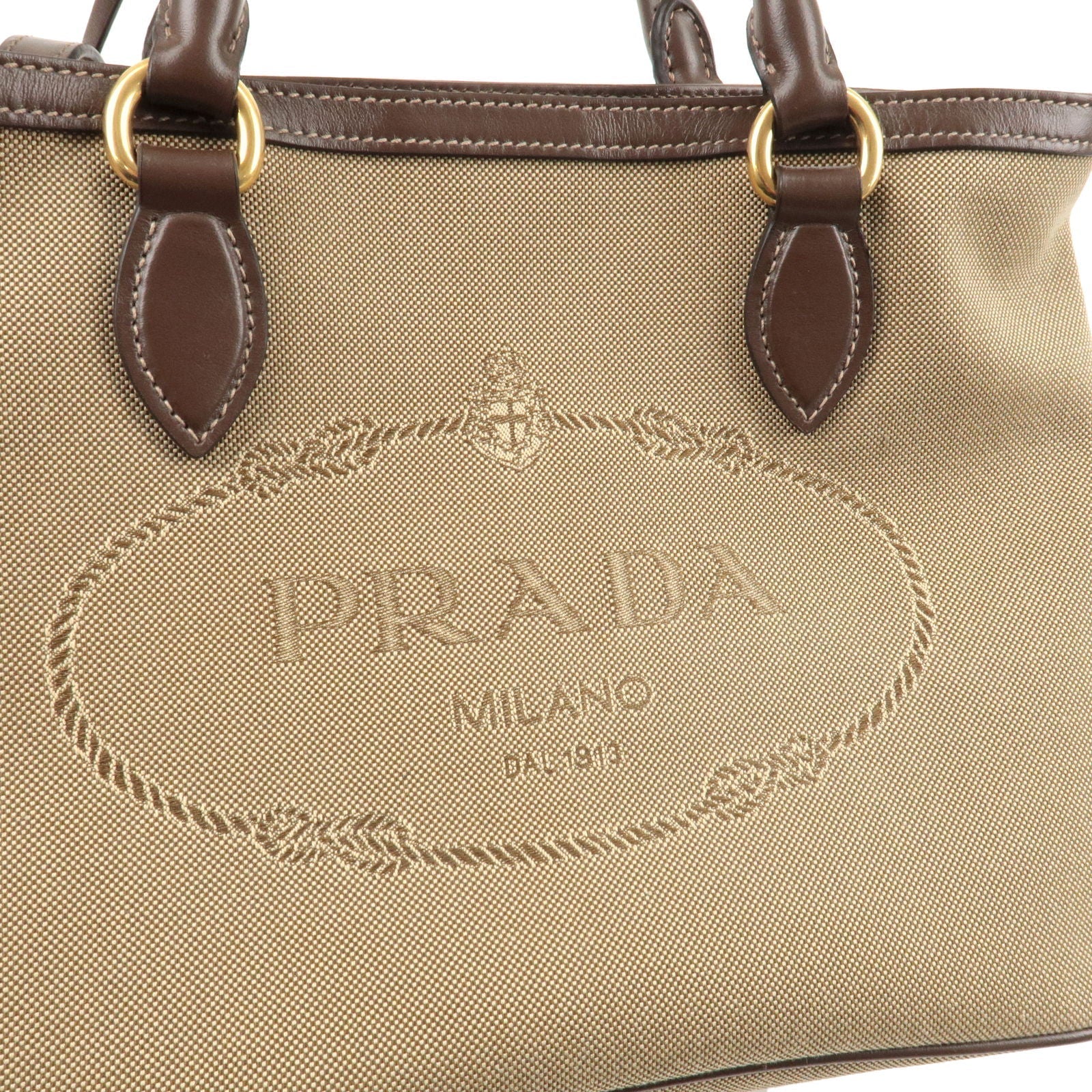 Prada Logo Jacquard Cartera satchel cruzada de lona en color beige con detalles de cuero